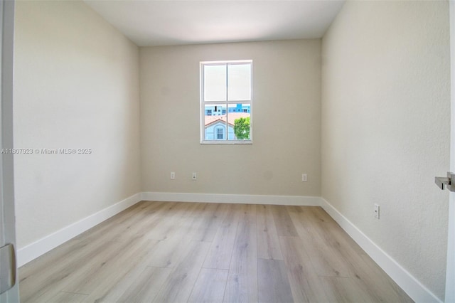 8144 NW 107th Path, Doral, FL 33178 - empty room featuring light wood-style flooring and baseboards
