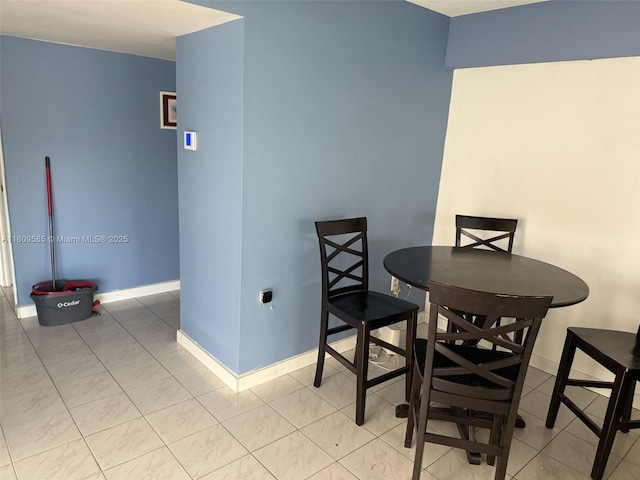 4168 Inverrary Dr Unit 111, Lauderhill, FL 33319 - dining area featuring baseboards and light tile patterned floors