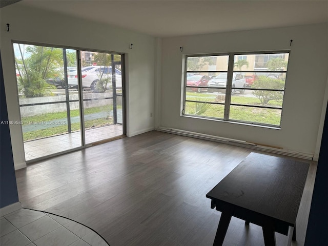 4168 Inverrary Dr Unit 111, Lauderhill, FL 33319 - unfurnished room featuring plenty of natural light and wood finished floors
