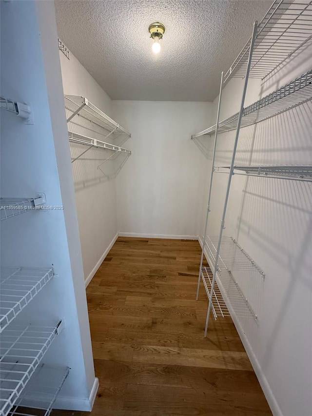 4168 Inverrary Dr Unit 111, Lauderhill, FL 33319 - spacious closet featuring wood finished floors