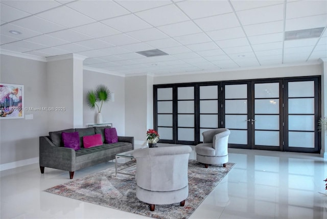 2017 S Ocean Dr Unit 1510, Hallandale Beach, FL 33009 - living room with ornamental molding, a drop ceiling, and baseboards