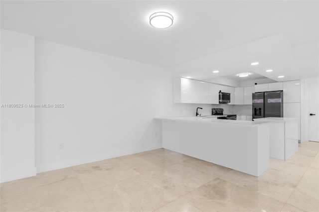 2300 Diana Dr Unit 302, Hallandale Beach, FL 33009 - kitchen featuring range with electric stovetop, fridge with ice dispenser, stainless steel microwave, modern cabinets, and recessed lighting