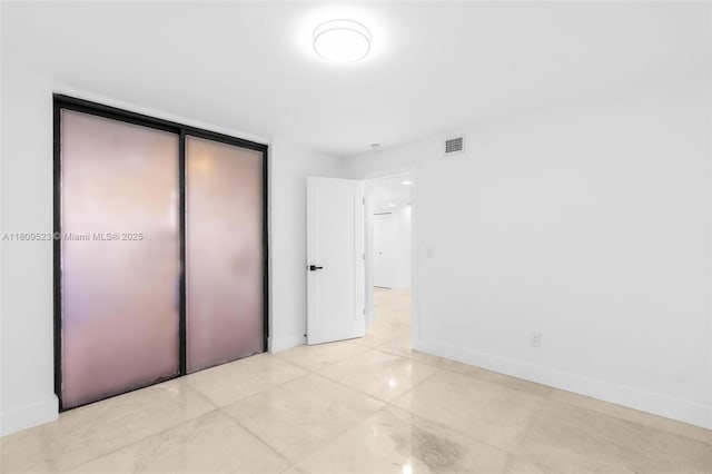2300 Diana Dr Unit 302, Hallandale Beach, FL 33009 - unfurnished bedroom with a closet and baseboards
