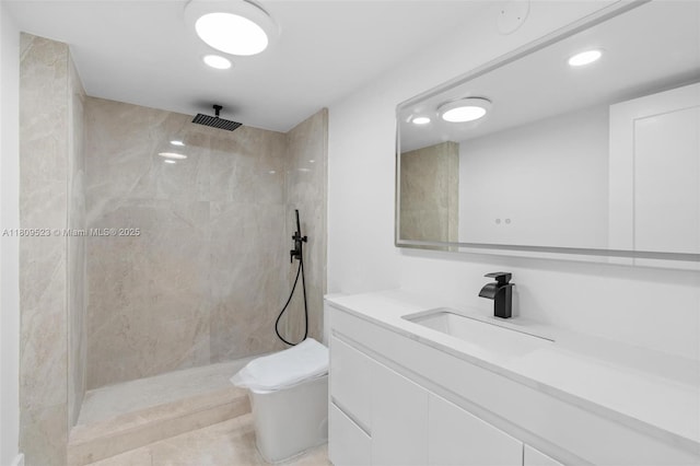 2300 Diana Dr Unit 302, Hallandale Beach, FL 33009 - bathroom featuring vanity, a tile shower, toilet, and recessed lighting