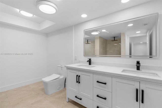 2300 Diana Dr Unit 302, Hallandale Beach, FL 33009 - full bath with double vanity, tiled shower, toilet, recessed lighting, and baseboards