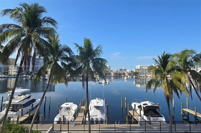 2300 Diana Dr Unit 302, Hallandale Beach, FL 33009 - dock area with boat lift and a water view