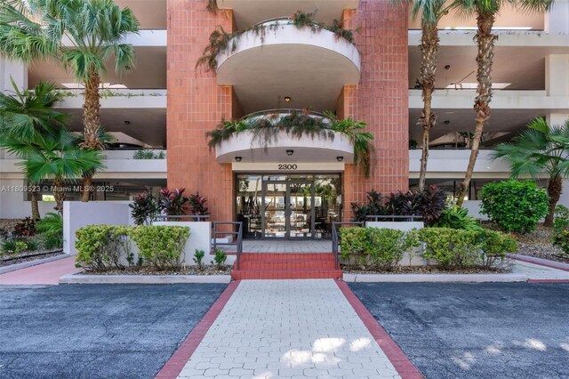 2300 Diana Dr Unit 302, Hallandale Beach, FL 33009 - property entrance featuring uncovered parking