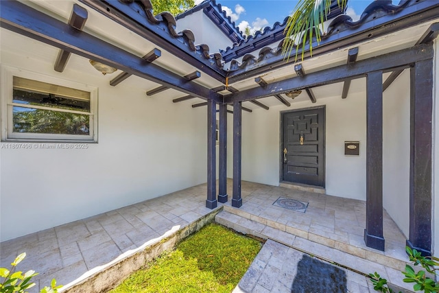 5757 Alton Rd, Miami Beach, FL 33140 - view of exterior entry featuring stucco siding