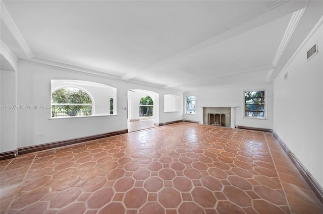 5757 Alton Rd, Miami Beach, FL 33140 - unfurnished living room with crown molding, baseboards, and a fireplace