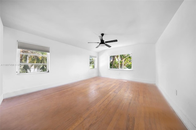 5757 Alton Rd, Miami Beach, FL 33140 - unfurnished room featuring light wood finished floors, a ceiling fan, and baseboards