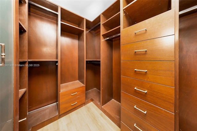 5757 Alton Rd, Miami Beach, FL 33140 - spacious closet featuring wood finished floors