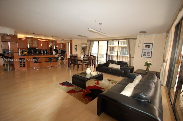 8877 Collins Ave Unit 507, Surfside, FL 33154 - living room with wood finished floors