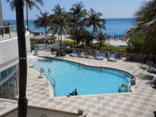 17375 Collins Ave Unit 2606, Sunny Isles Beach, FL 33160 - community pool with a water view and a patio