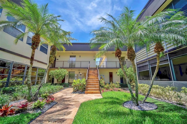 203 E Capri Unit E, Delray Beach, FL 33484 - view of building exterior with stairs