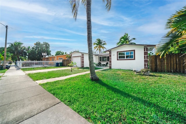 45 NW 188th St, Miami Gardens, FL 33169 - single story home featuring driveway, stucco siding, and an outbuilding