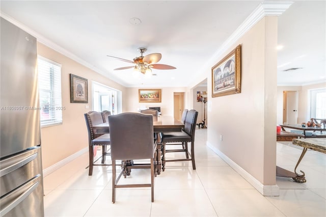 45 NW 188th St, Miami Gardens, FL 33169 - dining room with ornamental molding, ceiling fan, baseboards, and light tile patterned flooring