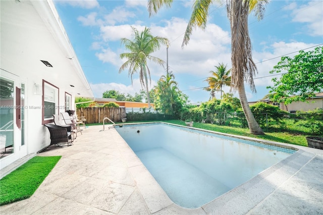 45 NW 188th St, Miami Gardens, FL 33169 - view of swimming pool with a fenced backyard and a patio