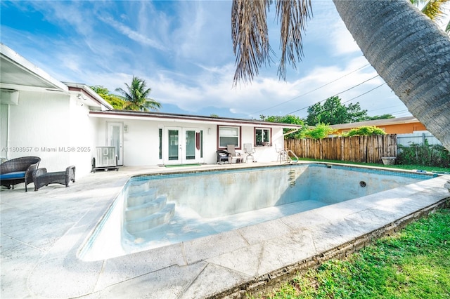 45 NW 188th St, Miami Gardens, FL 33169 - view of pool featuring french doors and a patio area