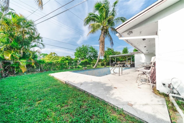 45 NW 188th St, Miami Gardens, FL 33169 - view of grassy yard featuring a patio