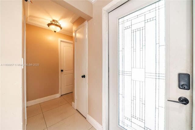 45 NW 188th St, Miami Gardens, FL 33169 - entrance foyer with crown molding, light tile patterned floors, and baseboards