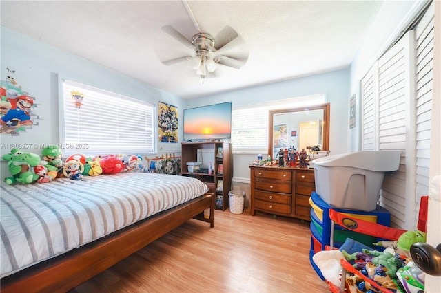 45 NW 188th St, Miami Gardens, FL 33169 - bedroom featuring wood finished floors, a closet, and a ceiling fan