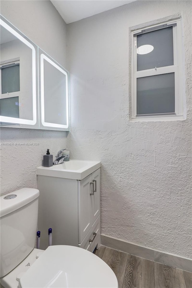 6039 SW 38th St, Miramar, FL 33023 - bathroom with vanity and wood finished floors