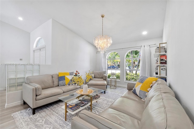 4647 NW 98th Ln, Coral Springs, FL 33076 - living area with wood finished floors, healthy amount of natural light, a chandelier, recessed lighting, and vaulted ceiling
