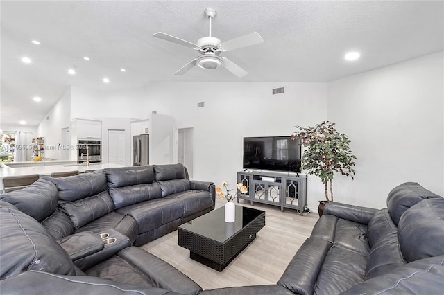 4647 NW 98th Ln, Coral Springs, FL 33076 - living area featuring ceiling fan, light wood-style floors, recessed lighting, and high vaulted ceiling