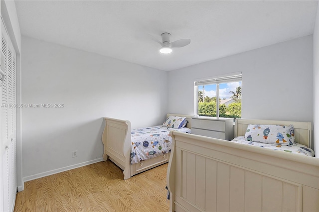 4647 NW 98th Ln, Coral Springs, FL 33076 - bedroom with light wood-type flooring and ceiling fan