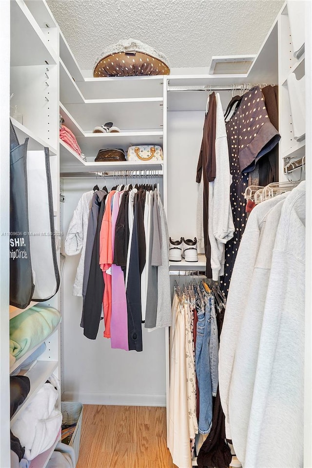 4647 NW 98th Ln, Coral Springs, FL 33076 - spacious closet with wood finished floors