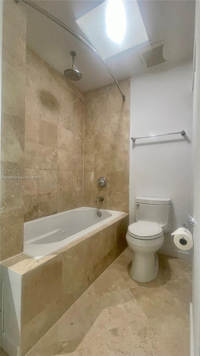 3025 Mary St Unit 5, Miami, FL 33133 - full bath featuring a combined bath / shower with rainfall shower, toilet, and tile patterned floors