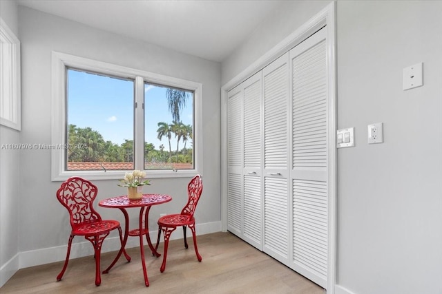 7932 Seville Pl Unit 2104, Boca Raton, FL 33433 - dining area with light wood-style floors and baseboards