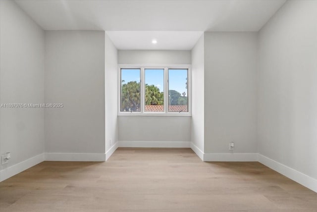 7932 Seville Pl Unit 2104, Boca Raton, FL 33433 - empty room with light wood-style flooring, baseboards, and recessed lighting