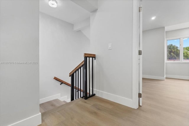 7932 Seville Pl Unit 2104, Boca Raton, FL 33433 - staircase featuring wood finished floors, baseboards, and recessed lighting