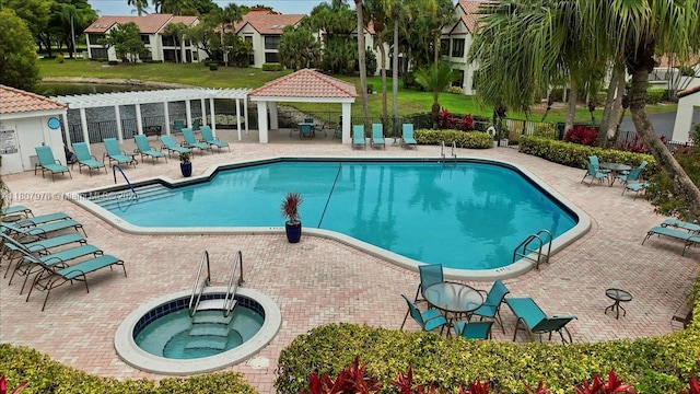7932 Seville Pl Unit 2104, Boca Raton, FL 33433 - community pool featuring a gazebo, a community hot tub, a patio, and a pergola