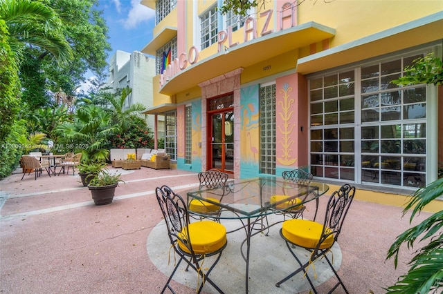 1051 Meridian Ave Unit 1-A, Miami Beach, FL 33139 - patio / terrace featuring outdoor dining space, a patio area, and an outdoor hangout area