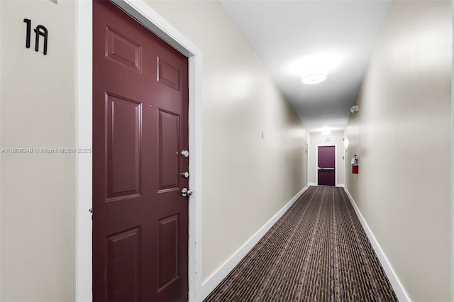 1051 Meridian Ave Unit 1-A, Miami Beach, FL 33139 - corridor with baseboards and carpet