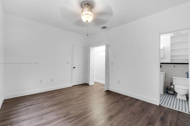 1051 Meridian Ave Unit 1-A, Miami Beach, FL 33139 - empty room featuring ceiling fan and wood finished floors