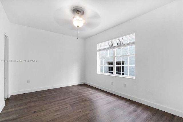 1051 Meridian Ave Unit 1-A, Miami Beach, FL 33139 - empty room with dark wood finished floors and ceiling fan
