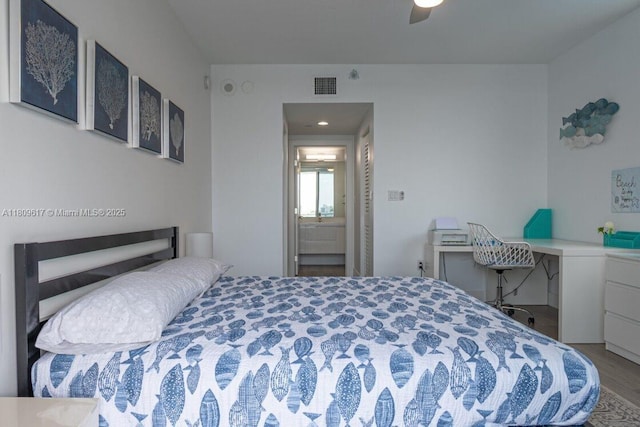 17050 N Bay Rd Unit 401, Sunny Isles Beach, FL 33160 - bedroom with wood finished floors, ceiling fan, and ensuite bath