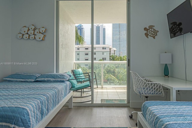 17050 N Bay Rd Unit 401, Sunny Isles Beach, FL 33160 - bedroom featuring access to outside and wood finished floors