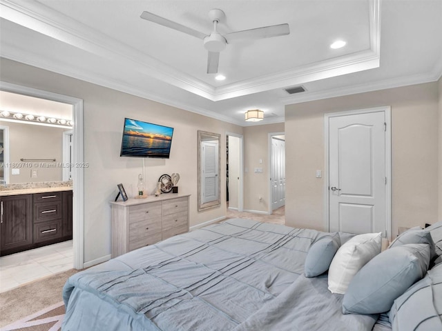 5907 Monterra Club Dr, Lake Worth, FL 33463 - bedroom featuring a raised ceiling, crown molding, ensuite bath, recessed lighting, and baseboards