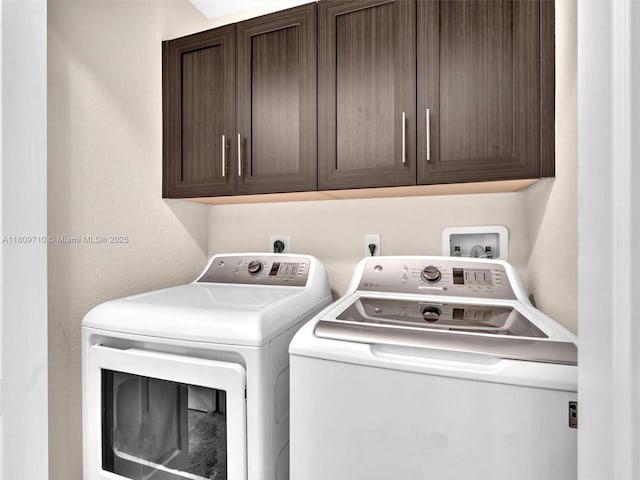 5907 Monterra Club Dr, Lake Worth, FL 33463 - laundry room featuring separate washer and dryer and cabinet space