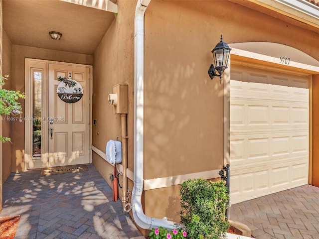 5907 Monterra Club Dr, Lake Worth, FL 33463 - property entrance featuring stucco siding