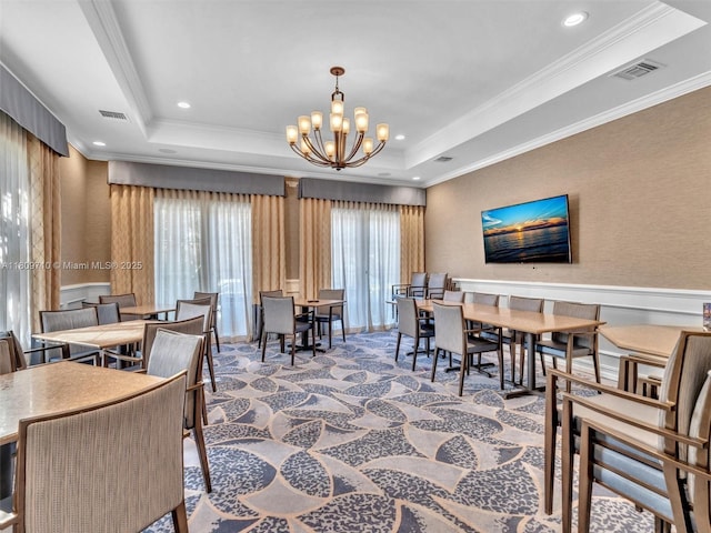 5907 Monterra Club Dr, Lake Worth, FL 33463 - carpeted dining room featuring a tray ceiling, crown molding, a chandelier, and recessed lighting