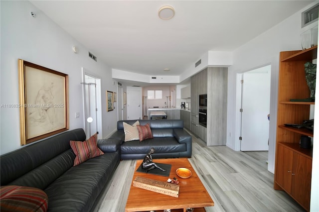 2900 NE 7th Ave Unit 2105, Miami, FL 33137 - living room with light wood-style floors