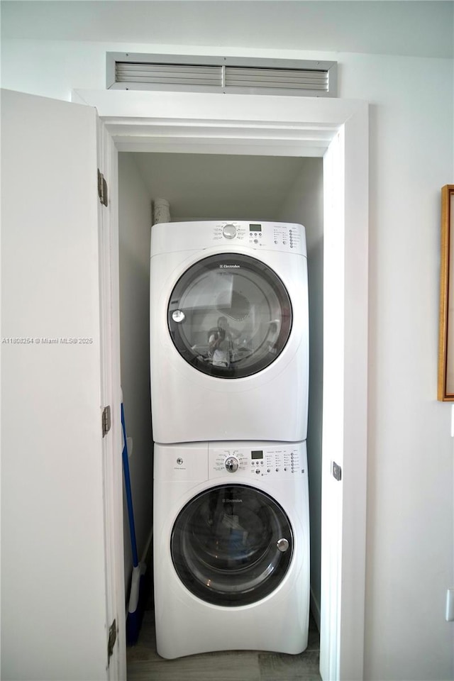 2900 NE 7th Ave Unit 2105, Miami, FL 33137 - washroom with stacked washing machine and dryer