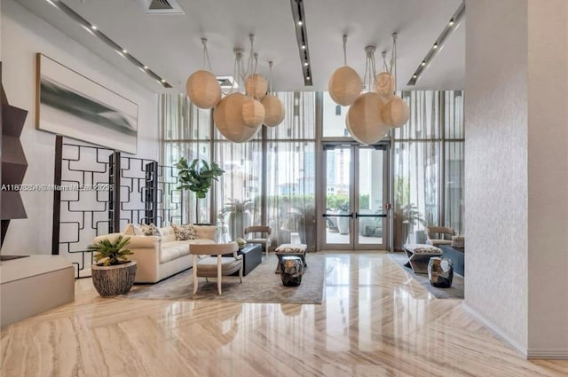 2900 NE 7th Ave Unit 2105, Miami, FL 33137 - common area featuring expansive windows and a towering ceiling