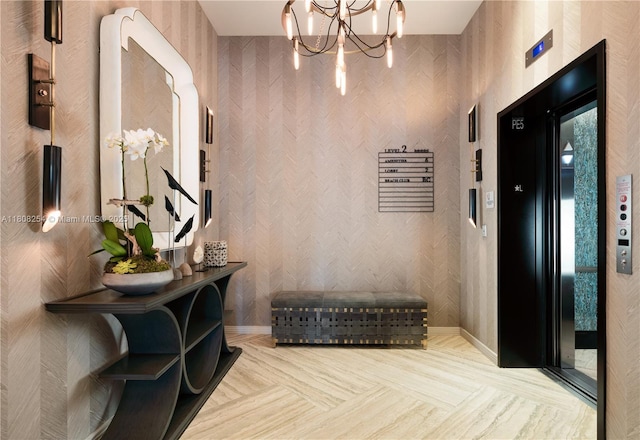 2900 NE 7th Ave Unit 2105, Miami, FL 33137 - entrance foyer featuring elevator, a chandelier, and baseboards