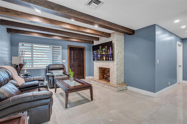 641 SW 50th Ave, Margate, FL 33068 - living area featuring beam ceiling, a stone fireplace, baseboards, and recessed lighting